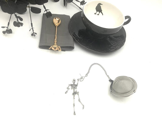 Tea Ball Infuser Skeleton Hanging from A Tea Ball